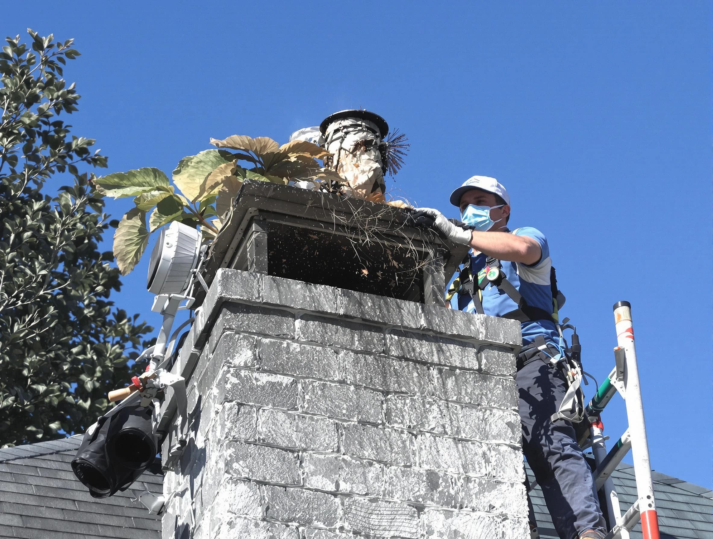 Ocean Chimney Sweep specialist performing chimney cleaning in Ocean, NJ