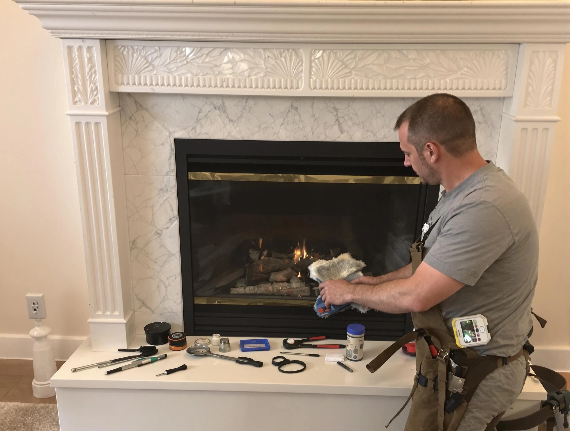 Ocean Chimney Sweep performing fireplace maintenance in Ocean, NJ